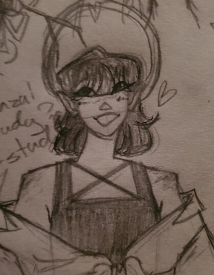 the carrd owner standing and smiling